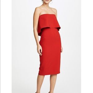 Likely strapless coral dress
